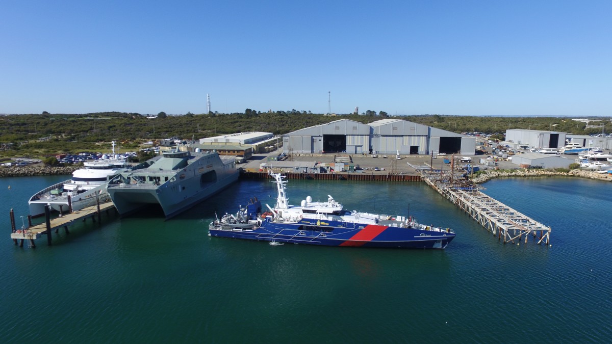 Austal Australia's shipyard in Henderson, WA with one 70m Large Crew Transfer Vessel, one 72m High Speed Support Vessel and one 58m Cape Class Patrol Boat alongside